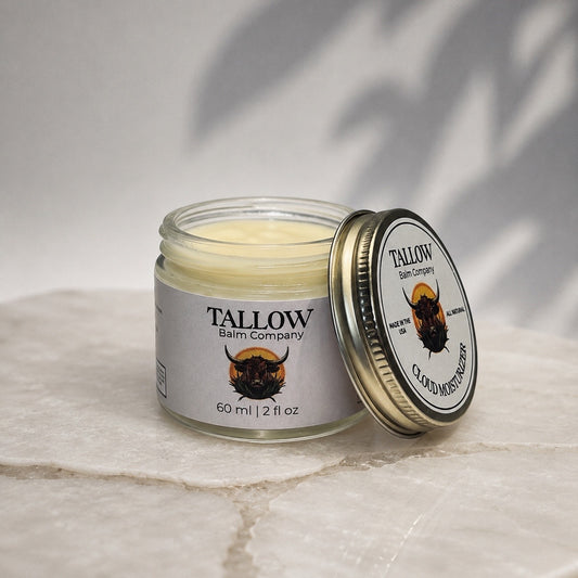 Open jar of Cloud Moisturizer, a beef tallow face moisturizer made with USDA Organic 100% Grass-Fed & Finished Tallow.
