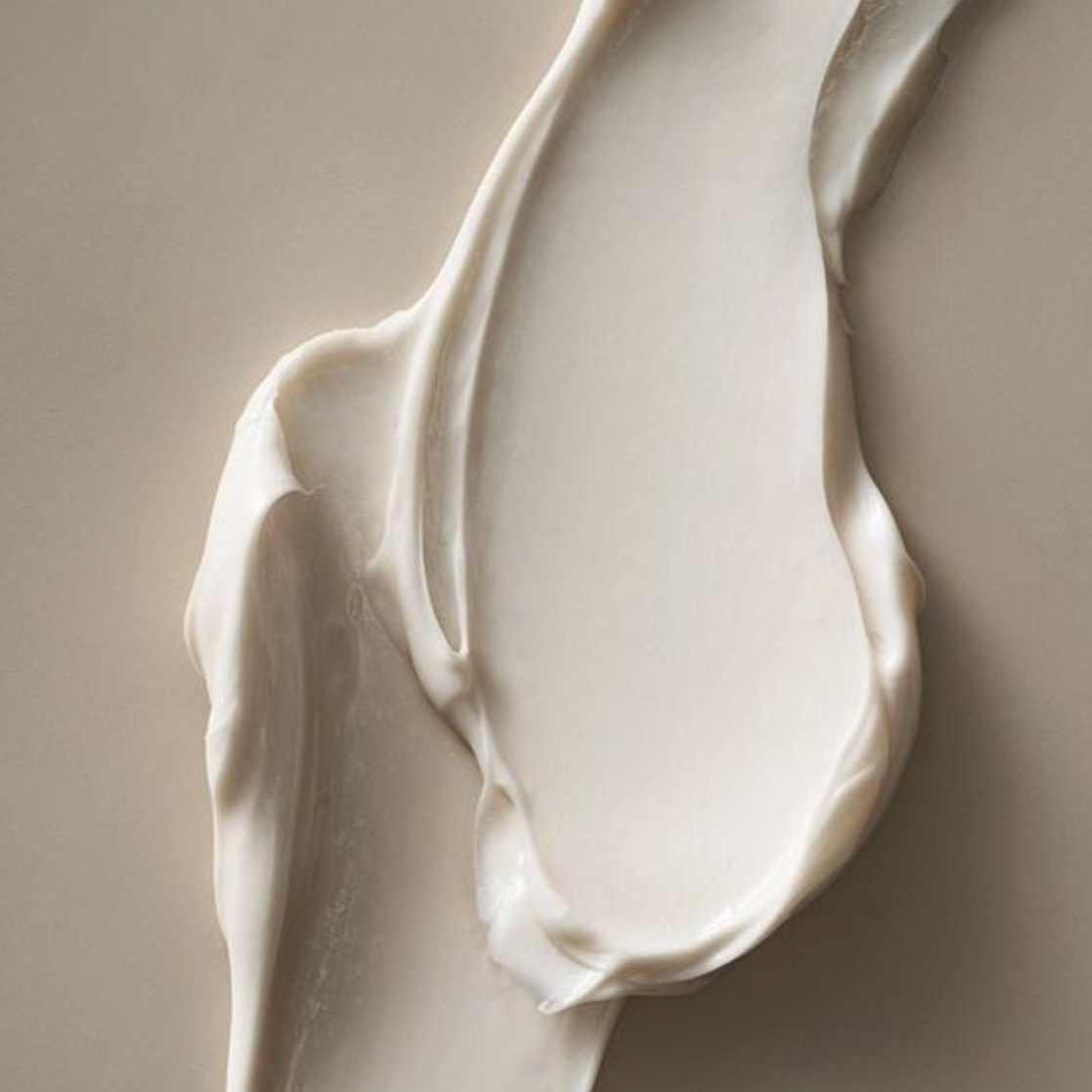 Close-up of the smooth texture of Cloud Moisturizer, a lightweight beef tallow face moisturizer made with USDA Organic 100% Grass-Fed & Finished Tallow.